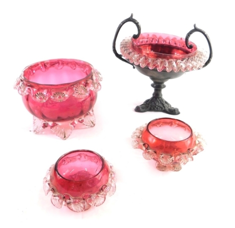 A cranberry glass sugar bowl, with clear floral border, 13cm diameter, three others pieces. (4)