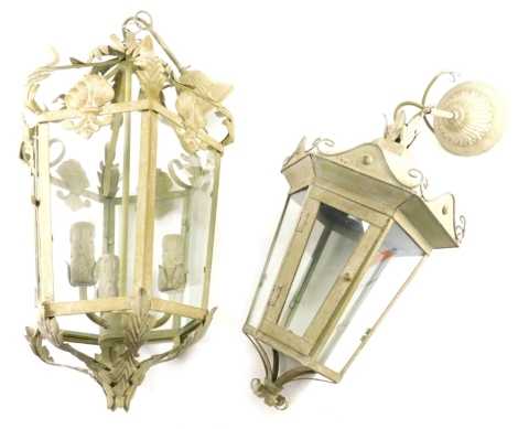 A graduated pair of Regency style glass lanterns, with acanthus leaf decoration and entwined tops, 53cm high. (2)