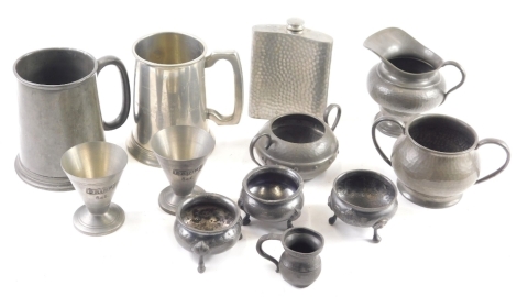 Various pewter, 19thC and other, tapering mug, 13cm high, salts, jug, hip flask, etc. (a quantity)