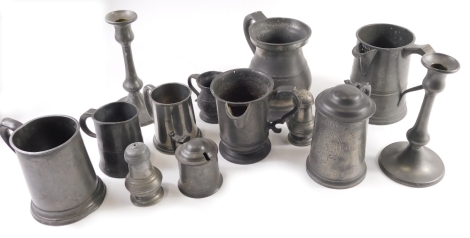 Various 19thC pewter to include lidded tankard with domed top, partially initialled, 17cm high, mugs, a pair of candlesticks, etc. (a quantity)