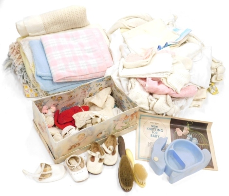 Various linen, partially worked, children's dresses, Christening box containing various children's shoes, boots, mainly leather, etc. (a quantity)