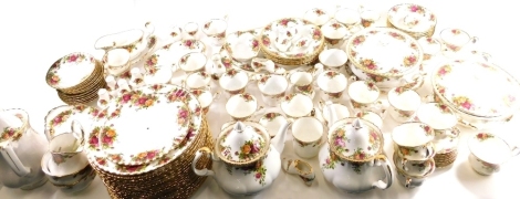 A comprehensive Royal Albert Old Country Roses part dinner service, to include a pair of lidded tureens, 15cm high, dinner plates, side plates, tea pots, part cruet, cups, saucers, oval meat plate, coffee pot, etc., printed marks beneath. (a quantity)