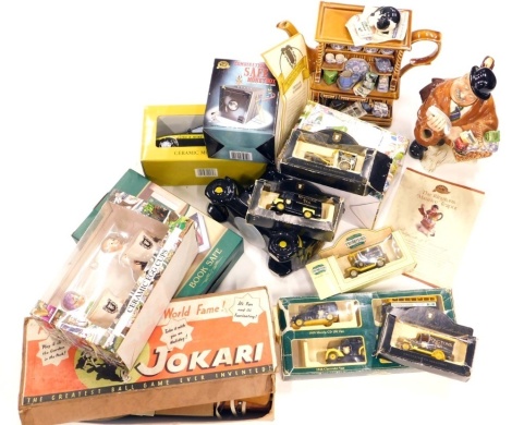 Various Ringtons Tea teapots, a Jokari vintage game, partially boxed, various die cast Ringtons Tea vans, 5cm high, etc., other Ringtons Tea teapots, some limited edition, etc. (a quantity)