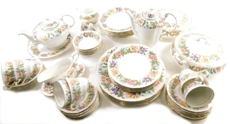 A comprehensive Paragon Country Lane pattern part dinner service, to include a pair of lidded tureens, 28cm wide, serving plate, teapot, dinner plates, side plates, cups, saucers, gravy boat, coffee pot, etc., printed marks beneath. (a quantity)