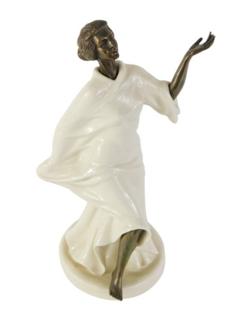 A Minton porcelain and metal Grecian dancer figure, 25cm high.