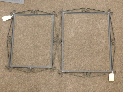 A wrought iron frame, and another smaller. (2)