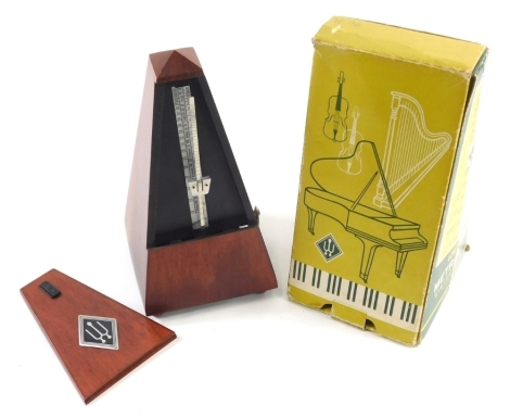 A Wittner metronome, 18cm high. (boxed)