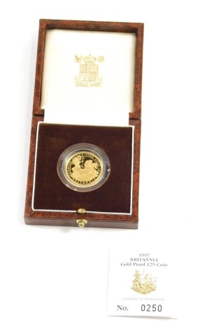 A Britannia 22ct gold quarter ounce gold proof twenty-five pound coin 1997, boxed with paperwork.