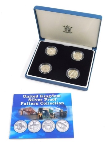 A United Kingdom silver proof pattern coin collection set, silver proof four coins with paperwork, in outer case.