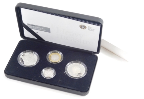 A Royal Mint heavy measure silver proof Piedfort four coin collection, with paperwork, case and outer box.