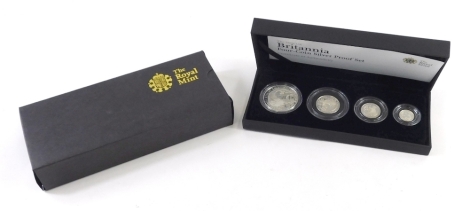 A Royal Mint 2008 Britannia four coin silver proof coin set, paperwork, outer box and packaging.