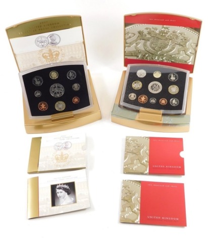 A Royal Mint 2002 United Kingdom Executive proof coin collection Golden Jubilee set, in an articulated case and another. (2)