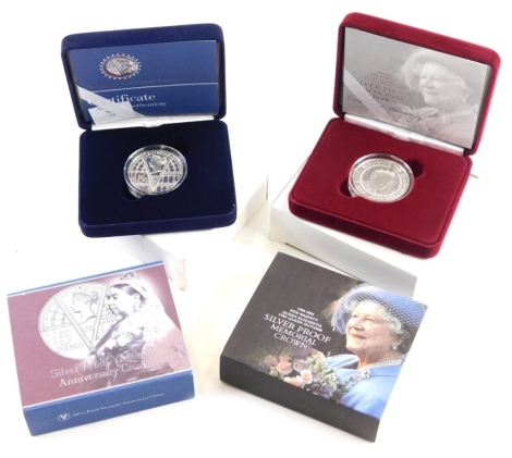 Various cased coins, a Queen Elizabeth, The Queen Mother silver proof memorial crown, and a silver proof Victorian anniversary crown, boxed with outer packaging. (2)