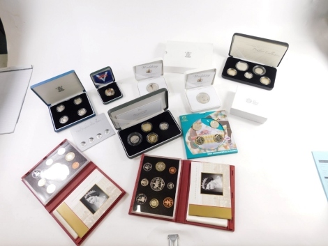 Various coins, World War II silver proof, 2007 Piedfort coin proof set, 2002 base metal coin set, a Royal Mint Royal Wedding silver coin, Prince William and Catherine Middleton, number 2418, and another. (a quantity)