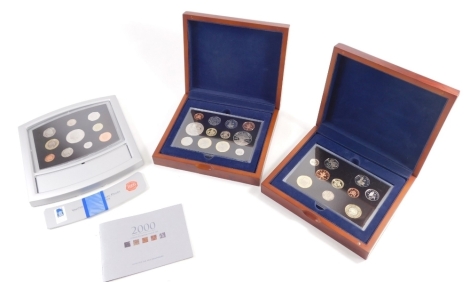 A Royal Mint 2000 Executive proof coin collection set, and another 2004. (2, each cased)