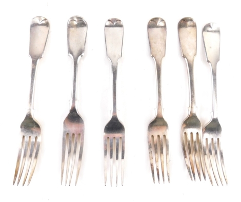 A set of four George IV table forks, fiddle pattern, another silver fork and a plated fork, various marks. 8oz. (a quantity)