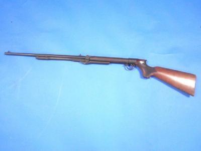 An early 20thC air rifle with hardwood stock