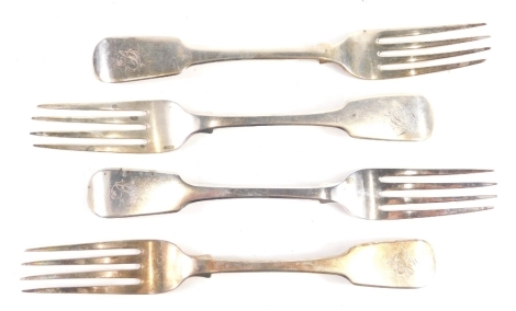 A pair of George IV table forks, fiddle pattern, London 1824, 19cm long, and two further similar, 8oz. (4)