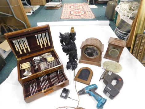 Various items, part canteen of cutlery, domed top walnut cased part clock, with later movement, 26cm high, ebonised figure of a bearded sage, part canteen of cutlery, an Elkington canteen, etc. (a quantity)