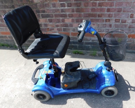 A Sterling Little Gem four wheeled mobility scooter, in blue with keys, basket and some instructions, 85cm high.