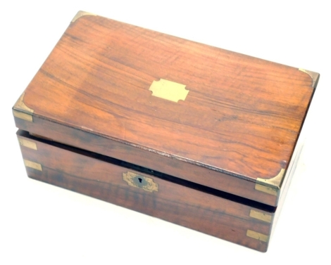 A Victorian walnut writing slope, of rectangular form with brass banding, the interior set with a tooled leather section with spaces for ink bottles and pens and deep well, 39cm wide.