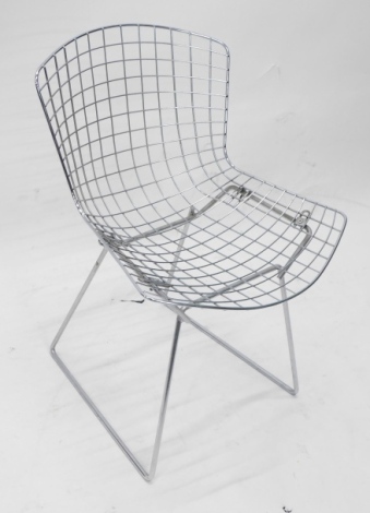 A chrome plated metal wire side chair, with tubular base in the manner of Harry Bertoia.