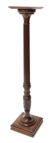 A 19thC mahogany torchere, with reeded column terminating in acanthus leaves, on a plinth base, square top, 137cm high.