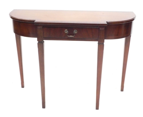 A mahogany side table, the top with bowed ends, above a frieze drawer on square tapering legs, 75cm high, 100cm wide, 38cm deep.