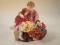 A Royal Doulton figure group - Flower seller's children