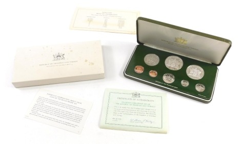 A Republic of Trinidad and Tobago mint set, to include two sterling silver coins and six others, in outer box and case.