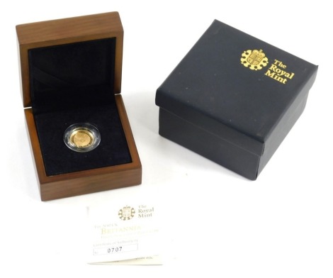 A Britannia 22ct gold ten pound proof coin, in box with outer case and paperwork.