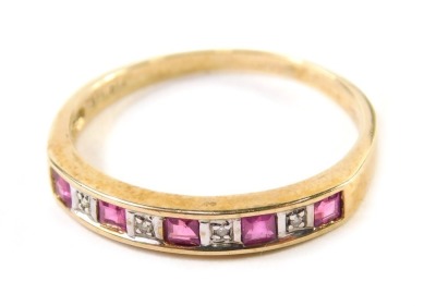 A 9ct gold dress ring, baguette cut with pink and white stones, size T, 1.9g all in.