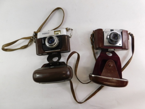 Two cameras, a 20thC Voigtlander Vitoret - F Camera, with Lanthar 2.8/50 lens, 12cm high. and another. (each cased)