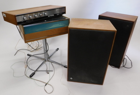 A 1960/70's His Master's Voice (HMV) hi-fi, comprising turntable on metal stand, amplifier and two speakers. WARNING! This lot contains untested or unsafe electrical items.  It is supplied for scrap or re-conditioning only. TRADE ONLY