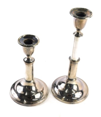 A pair of early 20thC silver plated telescopic candlesticks, with urn dish holders, articulated stems and circular feet, when lowered, 19cm high. (2) - 2