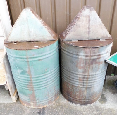 Two galvanised oil drums, each with a conical lid enclosing tap, 120cm high.