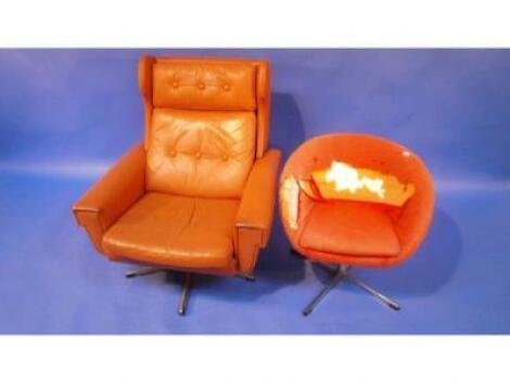 A 1960's Danish upholstered swivel armchair