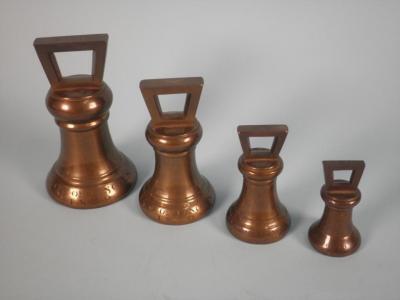 A set of four bell metal weights for the City of Lincoln