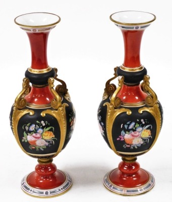 A pair of 19thC Ashworth ironstone vases, each with a tapering flared rim and bulbous body, with four scroll supports connecting body to neck, on circular base, the body decorated with floral sprays against a black ground, with red and black coloured band - 2