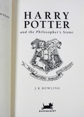 Rowling (J.K.). Harry Potter and the Philosopher's Stone, paperback, Bloomsbury, London 2001, cover and spine misprint, lacking foil stamping for 'Harry Potter' to the front cover and spine, and some star embellishment to cover. Provenance: bought as a - 4