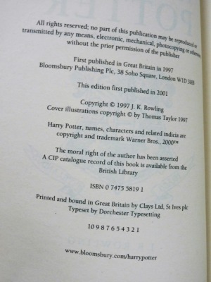 Rowling (J.K.). Harry Potter and the Philosopher's Stone, paperback, Bloomsbury, London 2001, cover and spine misprint, lacking foil stamping for 'Harry Potter' to the front cover and spine, and some star embellishment to cover. Provenance: bought as a - 5