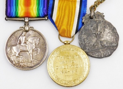 A World War I medal duo, comprising victory and campaign medals, awarded to Pte. J.P. Simms. 306516, Tank Corps, together with a tie clip and a pewter religious medallion with raised decoration. - 3