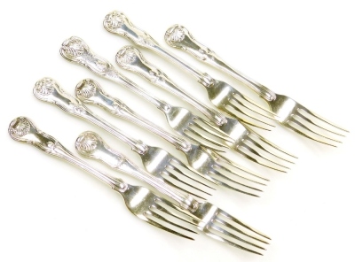 A set of four silver King's pattern side forks, London 1820, and four similar examples, hallmarks for London 1825, London 1789, and a further example with rubbed hallmarks, 15.90oz.