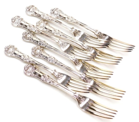 A set of eight silver King's pattern dinner forks, various dates, London 1835, 1757, and 1872, 26.41oz.