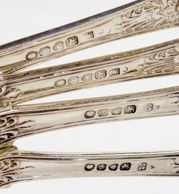 A set of eight silver King's pattern dinner forks, various dates, London 1835, 1757, and 1872, 26.41oz. - 2