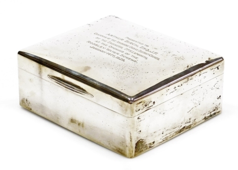 A George V silver cigar box, of plain form with presentation inscription to Arthur Birch, esq. J.P. Chairman of the Ashbourne Urban District Council by the Engineer Dr. H. Lapworth, at the opening of the Rodsley RWS January 14th 1929, the hinged lid revea