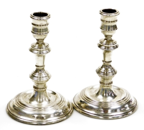 A pair of 17thC style silver candlesticks, JA Campbell, London 1990, loaded, 15.5cm high.