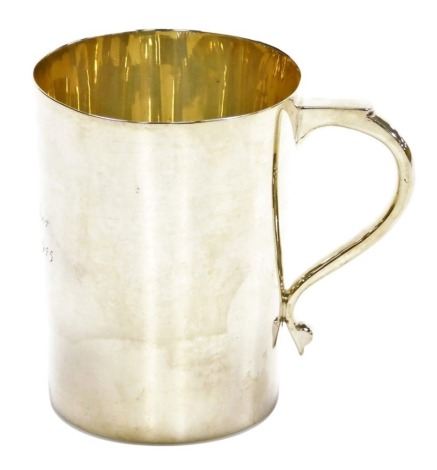 A George VI silver cup, of plain form with shaped handle and presentation inscription 'Christopher 27th July 1945,' Birmingham 1945, 6.98oz, 9.5cm high.