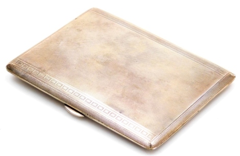 An Elizabeth II silver cigarette case, with engine turned decoration, the interior with presentation engraving C.P.O.B., 22.6.74, Birmingham 1967, 6.66oz, 12.5cm x 9cm.