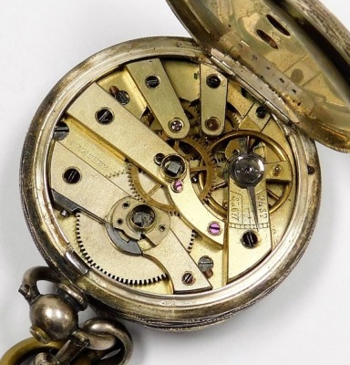 A ladies silver cased pocket watch, open face, key wind, circular enamel dial bearing Roman numerals, the case with foliate engraving, vacant shield reserve, with key, on a silver graduated curb link Albert chain, with T bar and two silver medallions fitt - 3